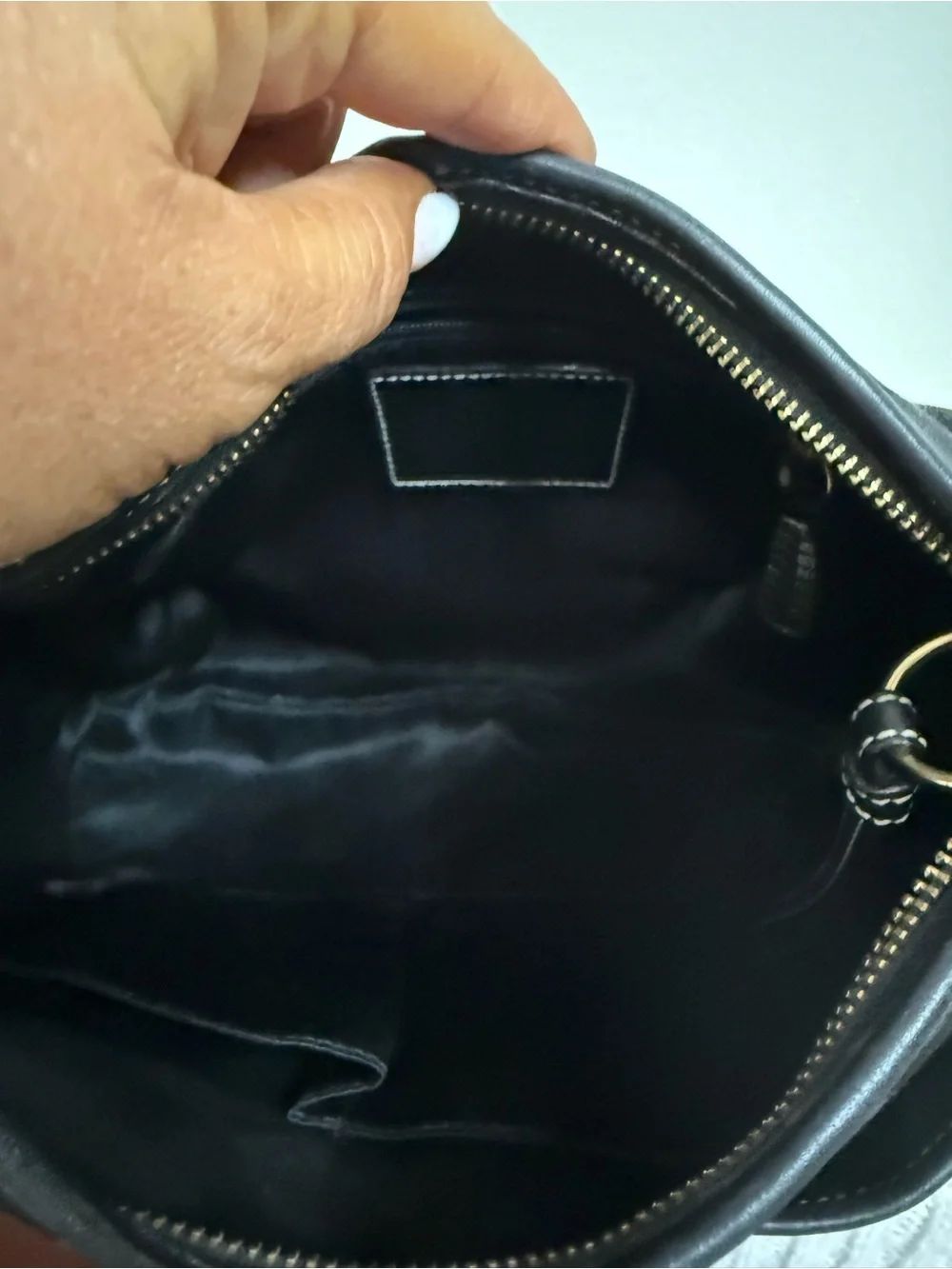 Coach Ergo Signature Jacquard Hobo bag featuring a black-on-black